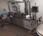 Vollautomatische Flaschenabfüll-, und Verschliessmaschine – Bild 4